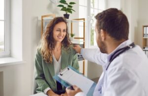 Doctor and patient talking during consultation